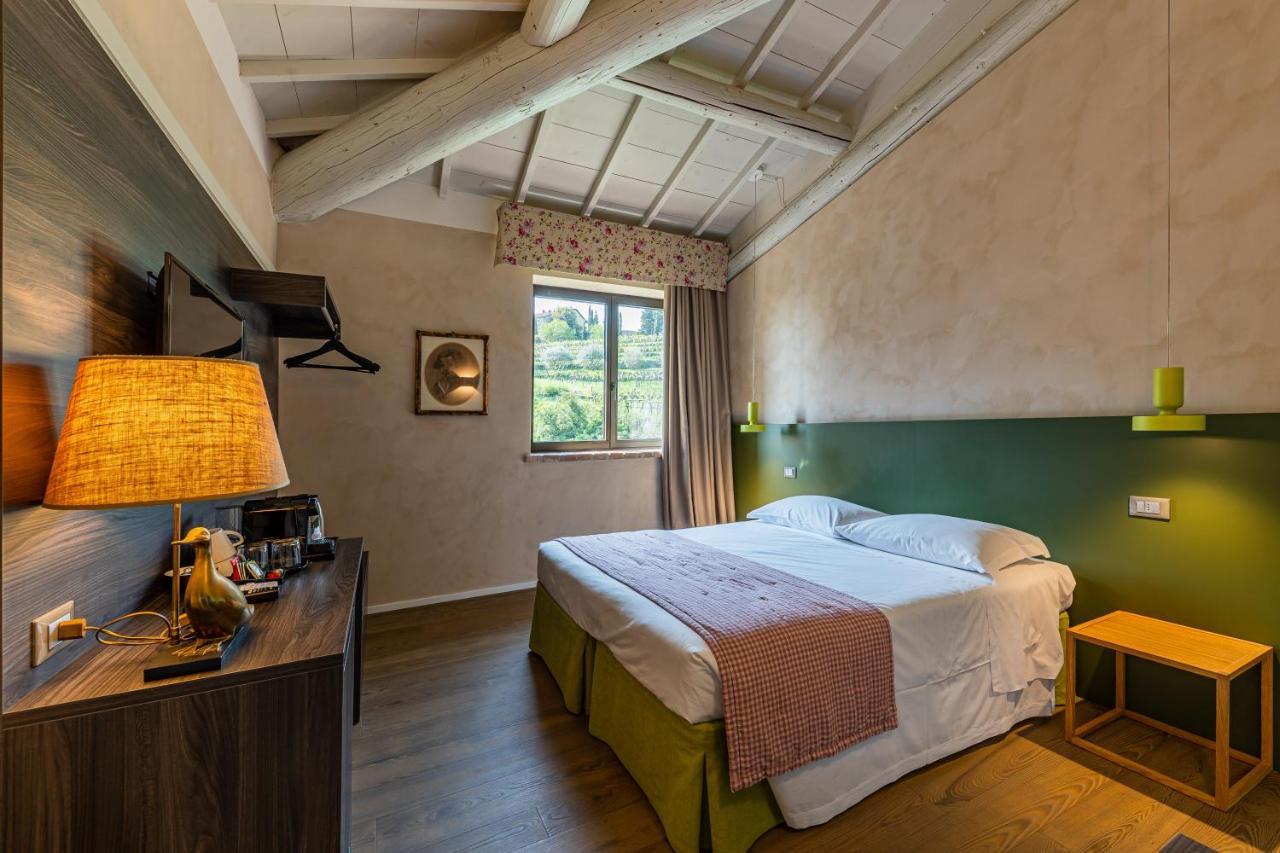 Relais Le Coste Hotel Lavagno Bagian luar foto